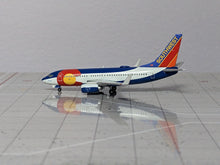 Load image into Gallery viewer, 1:400 GEMINI SOUTHWEST B737-700 N230WN